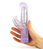 Purple Passion Clitoral Vibrator - being held by hand 