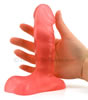 6 Inch Jelly Dildo Harness Attachment - held by hand