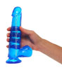 Blue Dildo held by hand
