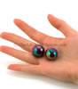 Iridescent Pearls Pleasure Balls holding both