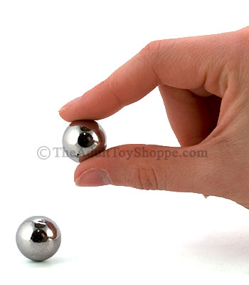 Silver Pleasure Balls holding one