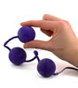 Soft Touch Vibrating Ben Wa Balls holding one ball
