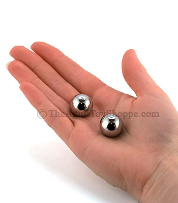 Silver Pleasure Balls holding both