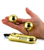 Golden Vibrating Ben Wa Balls showing size
